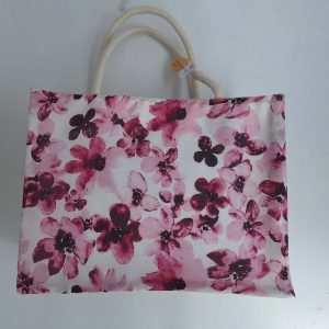 Blumenmotiv Tasche in sanften Rosatönen, ideal für kreative Geschenke und Naturprodukte.