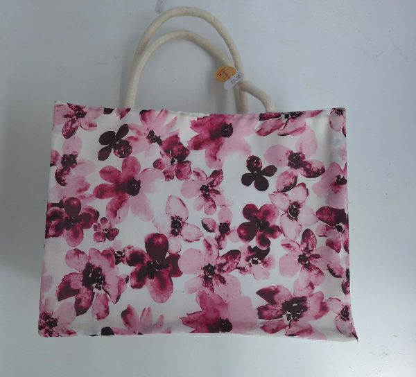 Blumenmotiv Tasche in sanften Rosatönen, ideal für kreative Geschenke und Naturprodukte.